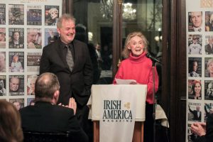 Ciarán O’Reilly and Charlotte Moore induct Irish musician Joanie Madden into the Irish America Hall of Fame.