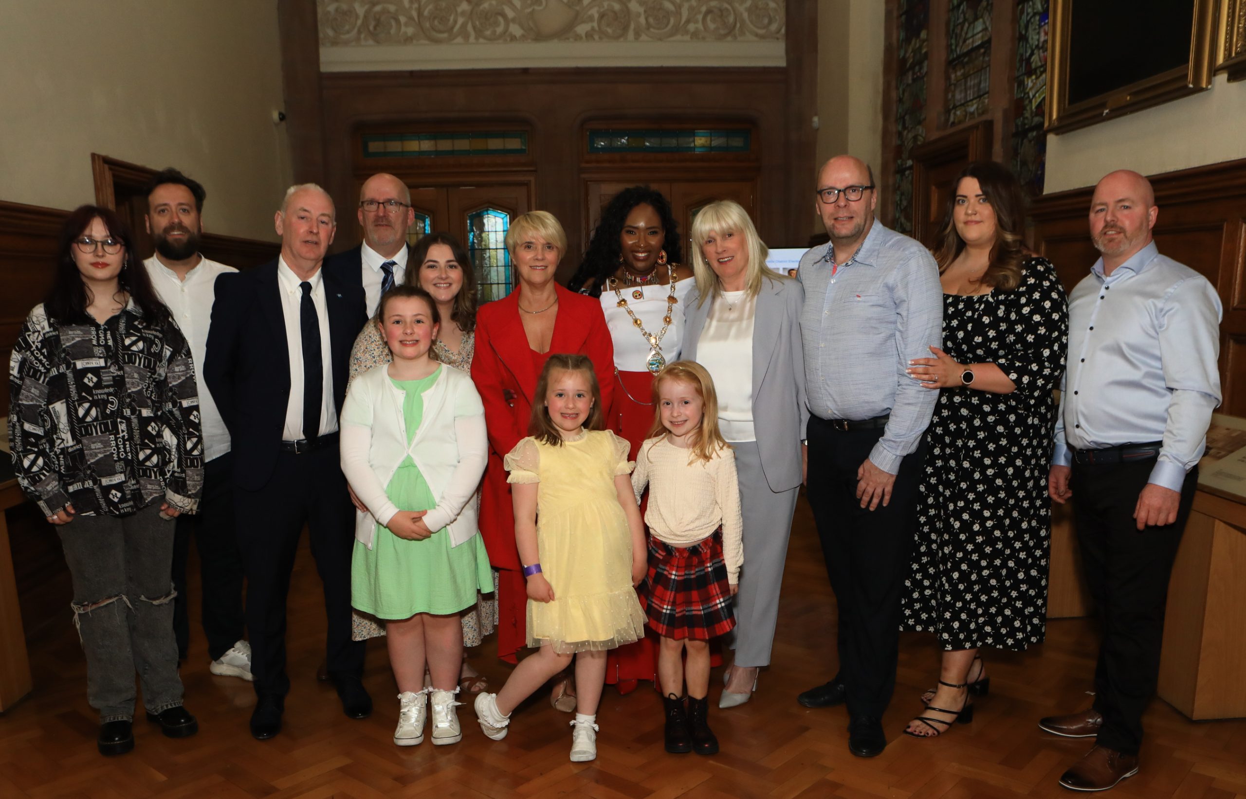 Mayor Lilian Seenoi-Barr at Guildhall celebration with husband, Paul Barr (4th from left) family and constituents