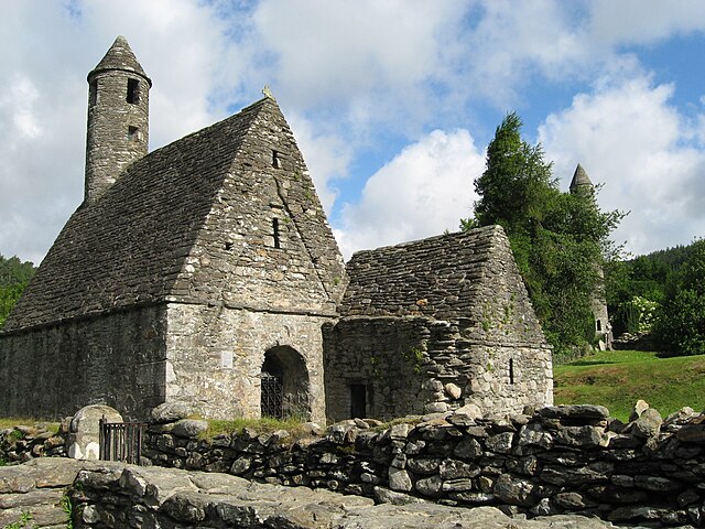 St. Kevin's Church, with the Round Tower of Glendalough in the background at right. Photo: Wikipedia