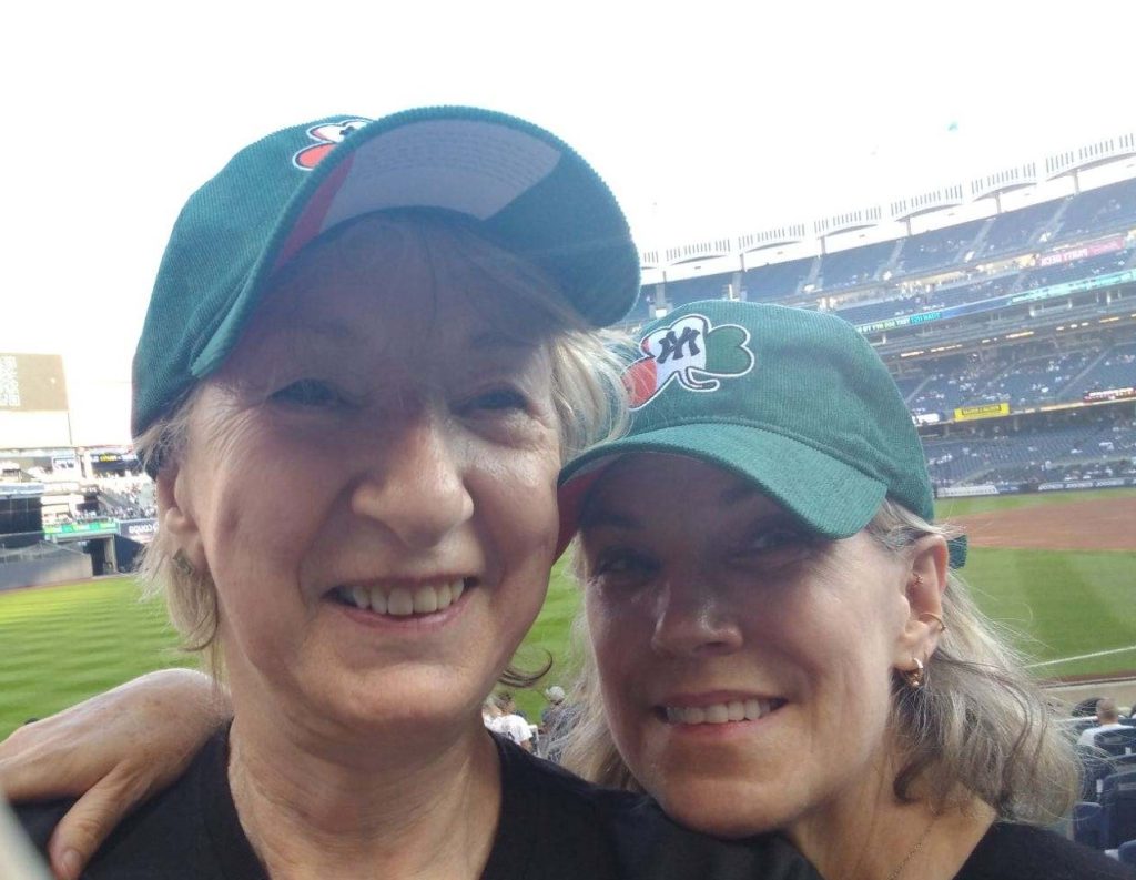 Irish America Editor-in-Chief and Holly Millea cheering on the Yankees at Irish Heritage night in 2024. Photo: Patricia Harty