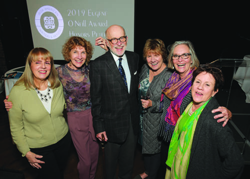Peter Quinn and his wife, Kathy (second from left) pose with fans at the O’Neill Award event.